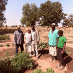 Sukuta garden with HT and Dep Ch Govs and teacher