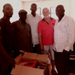 senior teachers, Me and Mr Darboe - HT with school materials I presented
